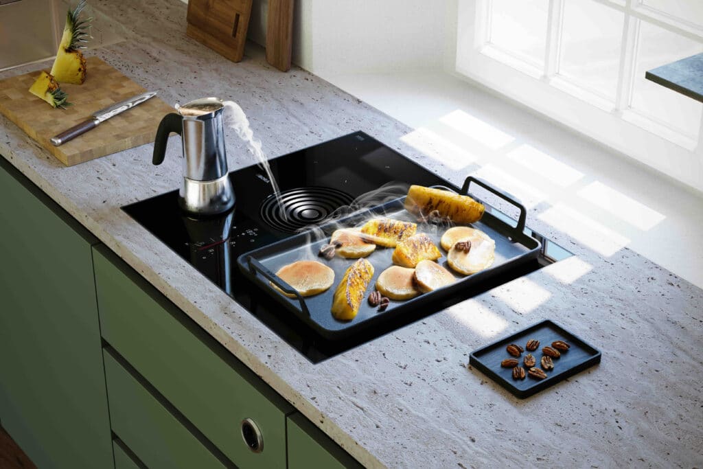 La hotte : suspendue au-dessus de la zone de cuisson ou « cachée » dans celle-ci ? 3