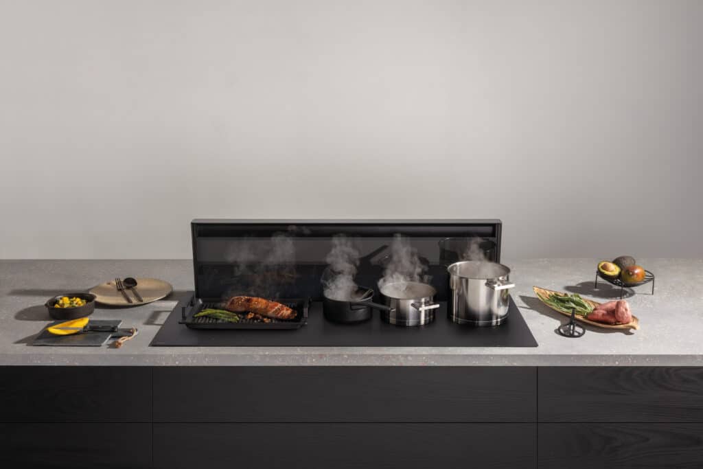 La hotte : suspendue au-dessus de la zone de cuisson ou « cachée » dans celle-ci ? 4